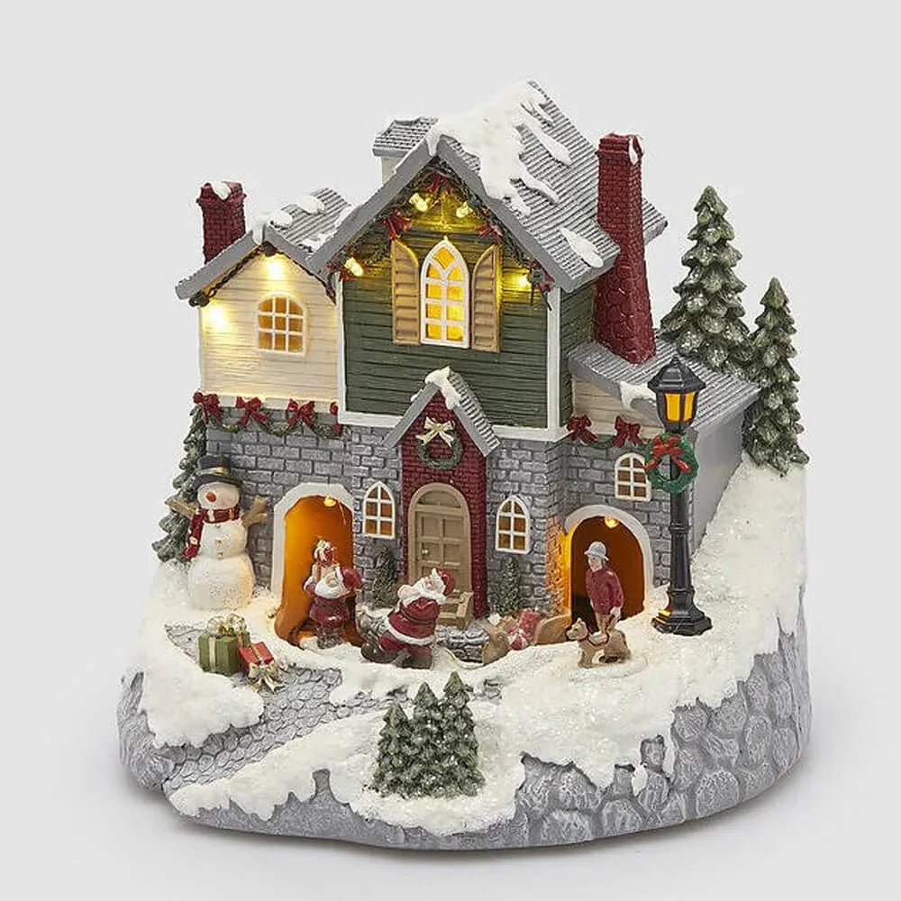 Villaggio Natalizio Luminoso con Babbo Natale e Slitta