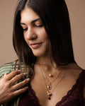 Collana Rocchetto Serpente e Mela